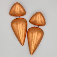 Modern Copper Earrings As A Gift, Silver Copper Earrings For Party, Orange Metal Earrings For Parties, Nickel-free Bronze Earrings For Party, Nickel-free Bronze Party Earrings, Orange Metal Earrings, Modern Orange Metal Jewelry, Orange Metal Drop Earrings, Orange Metal Pierced Earrings