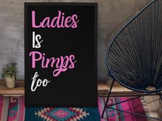 a sign that says ladies is princess too next to a chair and potted plant