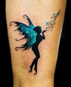 a tattoo with a fairy holding stars on her leg