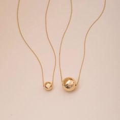 14K Real Gold Sparkle Ball Necklace, Minimalist Gold Ball Charm Necklace, Yellow Gold Hollow Bead Ball Choker Necklace, Tiny Sphere Ball Daily Necklace is a Great Gift For Her ► Adding a customized tiny bar at clasp may be a good idea: https://etsy.me/3cn9OQ5 Material: Solid Gold, real gold (not gold filled or gold plated) Karat: 14K (585) Available gold color: Yellow gold Chain Length - 14 inches Chain Length - 16 inches adjustable 15 inches (choker) Chain Length - 18 inches adjustable 16 inches Chain Length - 20 inches adjustable 18 inches Chain Length - 22 inches adjustable 20 inches We put a second circle on the chain to able to use adjustable. You can also buy the ball earring as complement this ball necklace via the following link: https://www.etsy.com/listing/653211369/14k-solid-gol Gold Necklaces With Polished Beads For Everyday, Everyday Gold Necklaces With Polished Beads, Everyday Gold Necklace With Polished Beads, Minimalist Ball Chain Jewelry Gift, Minimalist 14k Gold-filled Beaded Necklace As Gift, Gold Minimalist Polished Bead Necklaces, Gold Minimalist Beaded Necklace With Polished Beads, Minimalist Adjustable Ball Chain Necklace, Minimalist Gold Beaded Necklaces With Polished Beads