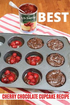 chocolate cupcakes with cherries in a muffin tin