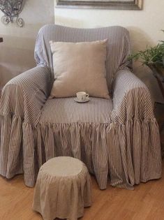 a chair and ottoman in a living room