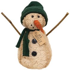 a stuffed snowman with a green hat and carrot in it's mouth, holding two sticks