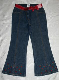 NWT Gymboree Cherry Pie denim blue jeans size 5.  Adjustable waistband  Grosgrain ribbon with decorative white stitching is sewn into place around the waist.  Vertical seams down the front lead down to the inverted pleats at the bottom that have embroidered cherries on both sides. Approx inseam measurement for the size 5 is 17 1/2 inches and for size 6 is 18 1/2 inches.  Check out all the matching items in my listings and in my ebay store.   All items Cherry Jeans, Cherry Accessories, Acubi Outfits, Embroidered Cherries, Belted Jeans, Inspo Fits, Closet Collection, Cool Buttons, Ribbon Belt