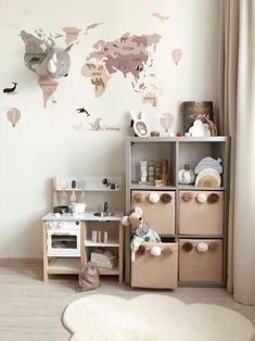 a child's playroom with toys and decor