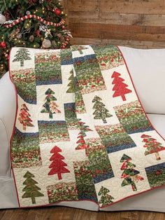 Annie’s® Christmas Special 2021 gives readers four chapters of festive designs from expert designers guaranteed to deliver hours of creative stitching and crafting fun. This collection of projects includes quilts, throws, wall hangings, table toppers, pincushions, decorative pillows, placemats, mug rugs, ornaments, tree skirts, and more! Sewing With Scraps, Christmas Tree Quilt Pattern, Holiday Quilt Patterns, Tree Quilt Pattern, Christmas Quilting Projects, Christmas Quilt Blocks, Vintage Quilts Patterns, Christmas Tree Quilt, Ornaments Tree