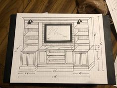 a drawing of an entertainment center with built in cabinets and drawers on top of it