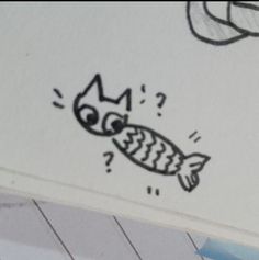 a drawing of a fish with a crown on it's head