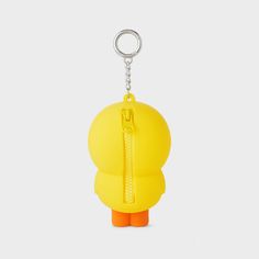 a yellow keychain with an orange handle and zipper on the front, hanging from a metal hook