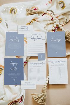 the wedding stationery is laid out and ready to be placed on top of the table