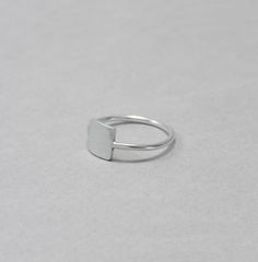 Square silver ring, geometric, minimalist sterling silver simple ring, everyday jewellery, gift for her Simple, minimalist, everyday ring, can be worn along with others but looks great on its own too. The sides of the square measure approx. 7 mm. This ring is made to order; please make sure you choose your size. Convo me if your size is not available. Feel free to ask me if you don't know which is the right size for you. Each ring is handmade to order and may slightly vary from the pictures. Ple Silver Minimalist Initial Ring For Promise, Minimalist Toe Ring For Everyday, Minimalist Silver Initial Ring, Minimalist Everyday Toe Rings, Simple Silver Stackable Rings For Everyday, Minimalist Sterling Silver Stackable Rings For Promise, Adjustable Sterling Silver Initial Ring In Modern Style, Minimalist Stackable Open Rings For Everyday, Minimalist Everyday Stackable Open Rings