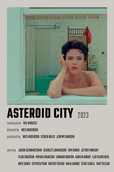 a movie poster for the film asteroid city, featuring a woman in a bathtub