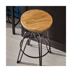 a stool with a wooden seat and metal legs