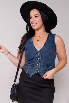 Don't just follow trends – set them with our City Chic Denim Vest! Crafted from premium denim, this vest exudes laid-back sophistication with its washed finish, adding a touch of vintage charm to any ensemble. Rock that effortlessly chic vibe with its trendy V neckline and sleek button-down design. Featuring faux pockets for that extra dose of style, it's the perfect fusion of fashion and function, elevating your wardrobe with its versatile appeal. 97% Cotton, 3% Spandex Hand Wash Cold Colors ma Casual Button-up Denim Vest With Pockets, Fitted Casual Denim Vest With V-neck, Fitted Button-up Medium Wash Denim Vest, Button-up Medium Wash Denim Vest With Pockets, Medium Wash Button-up Denim Vest With Pockets, Neoprene Bag, Denim Chic, Pants And Leggings, City Chic