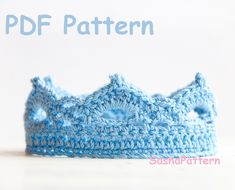 a crocheted blue crown is shown with the words pdf pattern on it