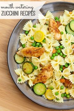 pasta with chicken, zucchini and peas on a plate