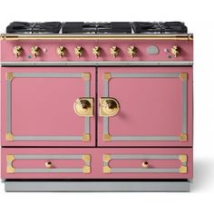 a pink stove top oven with two burners