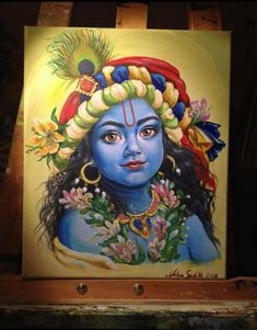 a painting of a woman with blue skin and headdress