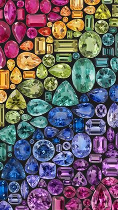 many different colored stones are arranged in the shape of a rainbow - hued diamond