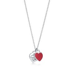 Inspired by the iconic key ring first introduced in 1969, the Return to Tiffany collection is a classic reinvented. A delicate duo of engraved tags on a simple link chain exudes sophistication and elegance. Sterling silver with red enamel finish; On a 16-18" adjustable chain | Return To Tiffany® Red Double Heart Tag Pendant in Silver, Mini, Size: 18 in. Colar Tiffany E Co, Tiffany Key Ring, Tiffany Blue Box, Diamond Drop Necklace, Tiffany And Co Necklace, Return To Tiffany, Tiffany Necklace, International Jewelry, Heart Tag