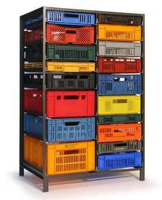 multicolored bins are stacked on top of each other in this shelving unit