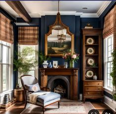 a living room filled with furniture and a fire place in front of a painting on the wall