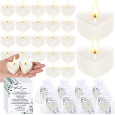 white heart shaped candles are being held by someone's hand and surrounded by small packages