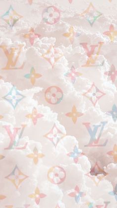 an image of snow and louis vuitton pattern on the surface with white clouds