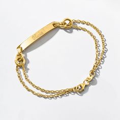 Ross-Simons - Name - Italian 14kt Yellow Gold ID Bracelet. 7". A little simplicity for your stack! From Italy, this 14kt yellow gold ID bracelet features a glossy bar centered on two chic cable chains. FREE engraving of a name with up to 10 characters in your choice of block or script type. Lobster clasp, 14kt yellow gold personalized ID bracelet. Dainty 14k Gold Engraved Bracelet, Adjustable 14k Gold Bracelet, Dainty Engraved Yellow Gold Bracelet, Classic Everyday Gold Bracelet Engraved, Classic Adjustable 14k Gold Bracelet, Minimalist 14k Gold Bracelet For Personalized Gift, Adjustable Classic 14k Gold Bracelet, Everyday 14k Gold Engraved Bracelet, Classic 14k Gold Personalized Chain Bracelet