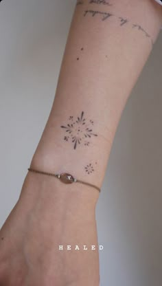 a woman's arm with a tattoo on it that says, happy new year