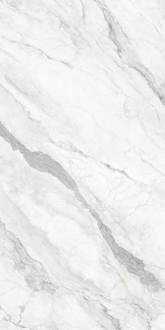 a white marble textured surface with grey lines