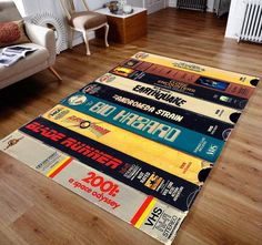 a pile of books sitting on top of a wooden floor