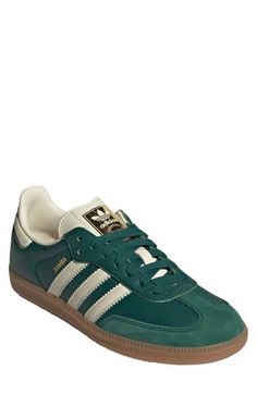 From the soccer pitch to the streets, this always-original sneaker maintains its legacy with luxe leathers and iconic 3-Stripes at the sides. Leather upper/textile lining/synthetic sole Imported Womens Green Sneakers, Sambas Fits Women, Womens Adidas Sneakers Outfit, Green Sambas Outfit Women, Classic Leather Sneakers With Three Stripes, Women’s Trendy Sneakers 2024, Adidas Samba Shoes Outfit, Green Sambas Outfit, Fall Sneakers 2024