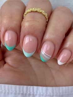 21 Turquoise Nails That'll Make You Stand Out This Summer | The KA Edit #nails #nailsdesign #nailsart, #springnails2024 #aprilnails, #summernails. https://whispers-in-the-wind.com/summer-nail-trends-10-stunning-designs-to-try-now/?nails Turquoise And White Nails Designs, Gel Nails For Cruise, Cute Color French Tip Nails, Colored French Tip Nails Short Round, Spring Cruise Nails, Nail Ideas Rounded Shape, Tourquise Nails Design Short, Short Nail Designs Easy Simple, Aqua Prom Nails