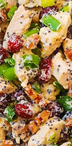 a salad with chicken, broccoli and cranberries