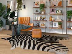 a living room with a zebra print rug and shelving units on the wall behind it