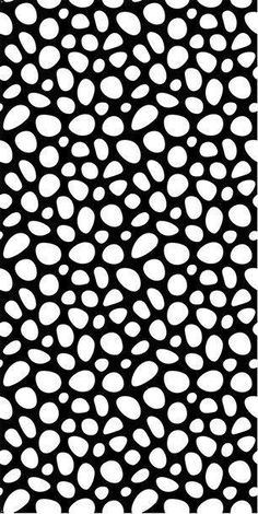 a black and white pattern with circles