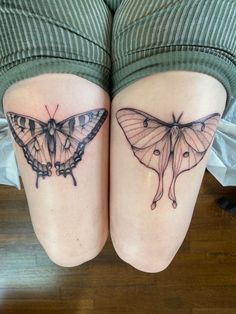 two butterfly tattoos on both legs