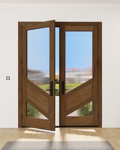 an open wooden door in a white room with a rug on the floor next to it