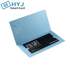 a blue folder with a smart card attached to it