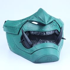 The mask is a nod towards ancient Japanese mythical figures, the Oni, updated for the modern age with a half-face design and cyberpunk accents. Details: We have padded the inside of the mask for your facial comfort. The mask can stay on your face for a long time in the activity you use. It does not cause pain on your face and you can breathe comfortably. It is very robust in your activities with its high filling and extra layer thickness. You can adjust it according to your face with its adjustable straps. If you wear glasses, you can use the mask with glasses. Suitable for your cosplay events, Halloween events, festivals, parties, and to wear with your daily outfits. If you'd like to see more japanese-style cyberpunk masks, then head over to our cyberpunk oni mask collection. Cyberpunk Oni Mask, Cyberpunk Oni, Mask With Glasses, Cyberpunk Masks, Style Cyberpunk, Futuristic Helmet, Mask Collection, Kitsune Mask, Halloween Events