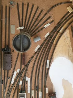 an overhead view of a train track with many different types of tracks and wires attached to it