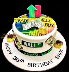 a birthday cake decorated with money and coins