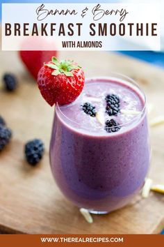 a smoothie in a glass with strawberries on top and the text, breakfast smoothie with almonds