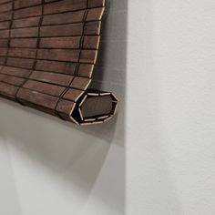 a piece of wood that is on the wall