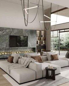 modern living room with large white couch and fireplace