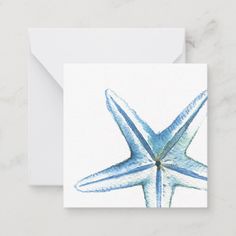 a blue starfish greeting card on a white background