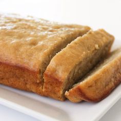 two slices of bread sitting on top of a white plate