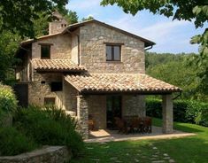 an old stone house in the countryside