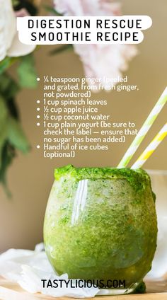 a green smoothie in a glass with two straws on top and the recipe below